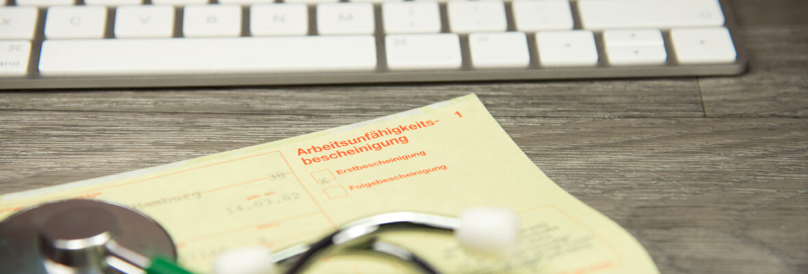 Krankenschein und ein Stethoskop